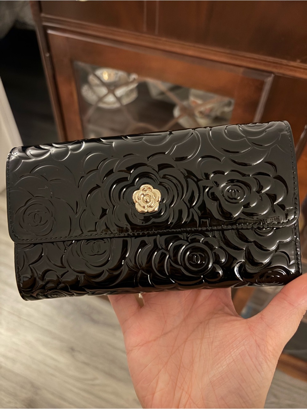 Chanel Black Floral Embossed Patent Wallet with Gold Flower Accent